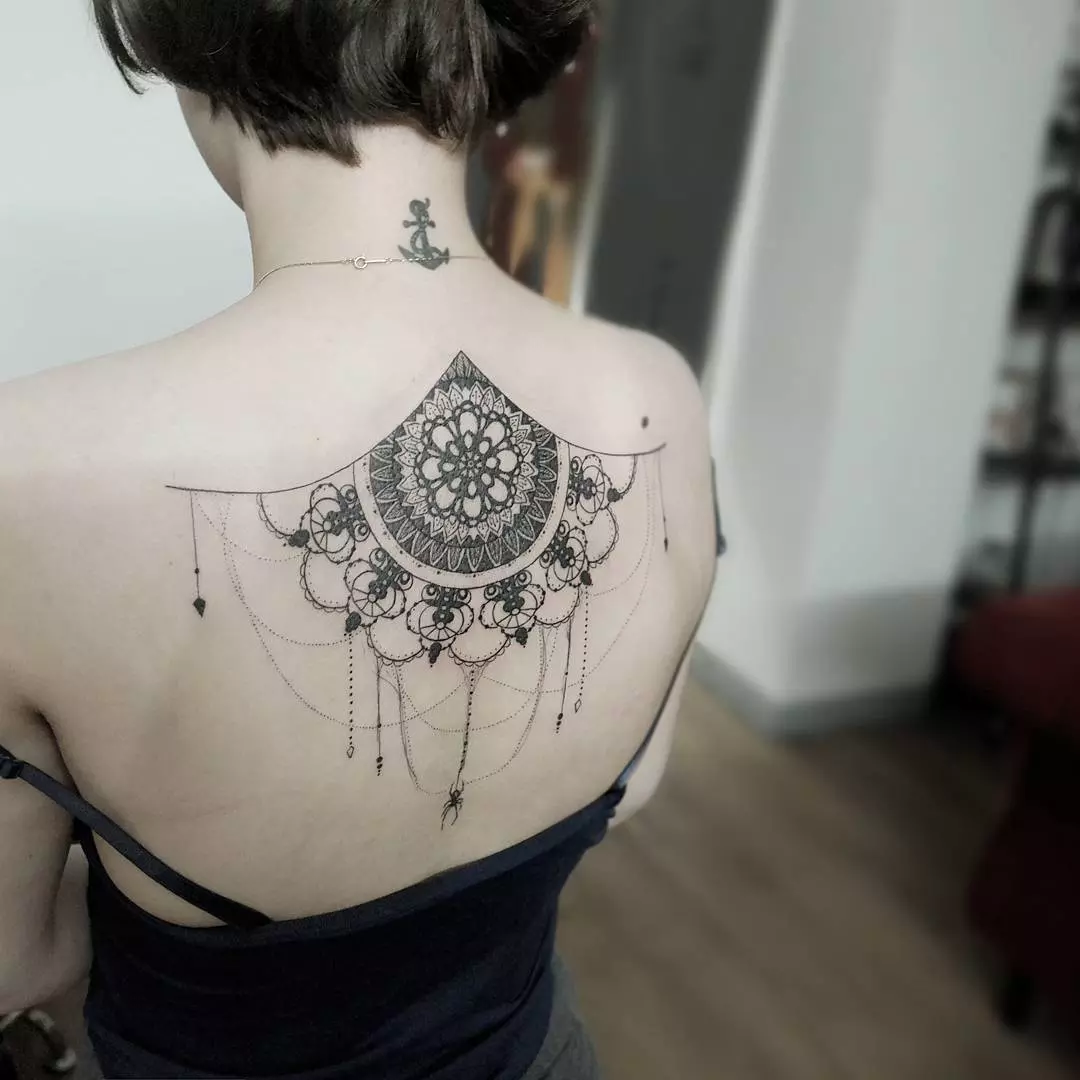 Lace Back Tattoo: Embrace Elegance and Intricacy.